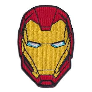 Peut inclure: Un patch brodé représentant le visage d'Iron Man. Le patch est rouge et jaune, avec un design détaillé du casque d'Iron Man, y compris ses yeux bleus emblématiques.