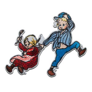 May include: Two embroidered iron-on patches depicting a girl and boy in vintage clothing. The girl is wearing a red and white striped dress and holding a stick. The boy is wearing a blue shirt and pants and a blue cap.