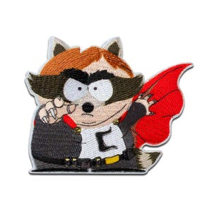 Könnte beinhalten: Gestickter Aufnäher mit einer Comic-Waschbärfigur in einem Superhelden-Kostüm. Der Waschbär hat eine schwarze Maske, braunes Haar und einen roten Umhang. Der Aufnäher befindet sich auf weißem Hintergrund.