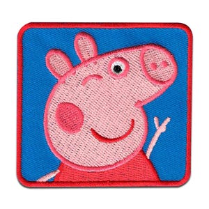 May include: Embroidered patch of a smiling, winking pig with pink skin, a red snout, and a red outfit. The pig is set against a blue background with a red border. The patch is square-shaped.
