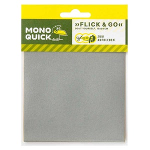 May include: A silver, self-adhesive sheet for crafting projects. The sheet is packaged in a yellow and black package with the text "MONO QUICK" and "FLICK & GO" on it. The package also says "DO IT YOURSELF. 10x20 CM" and "ZUM AUFKLEBEN".