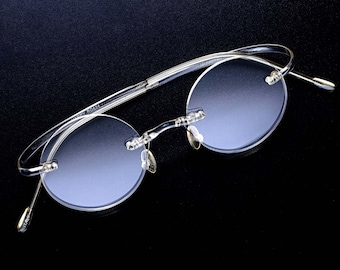 Round prescription eyeglasses frame, made in Italy. Super lightweight memflex glasses victorian style, rimless John Lennon glasses