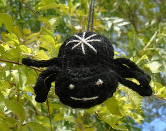 Black crochet spider in the form of amigurumi or brooch or keychain Ludi the one that weaves destiny