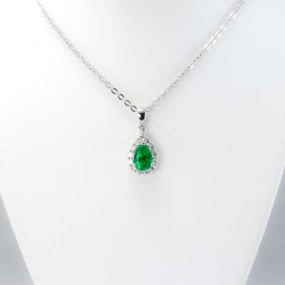 Natural Colombian Emerald and Diamond Halo Pendant in Platinum