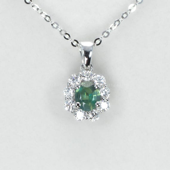 Oval Alexandrite Pendant with Diamond Halo in Platinum