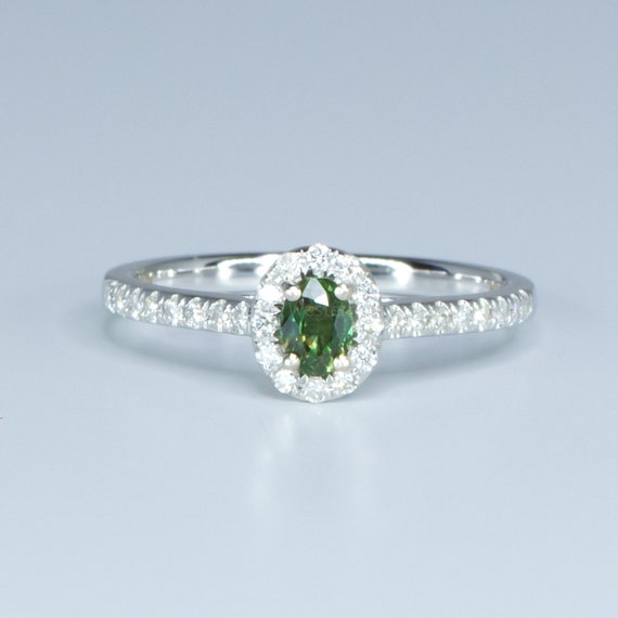 Natural Alexandrite Diamond Halo Ring in 18 Carats Gold