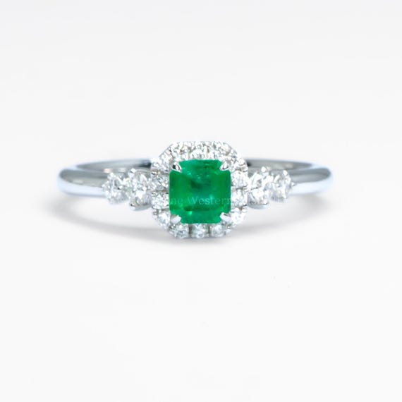 Platinum Ring with Emerald Cut Colombian Emerald and Diamond Halo