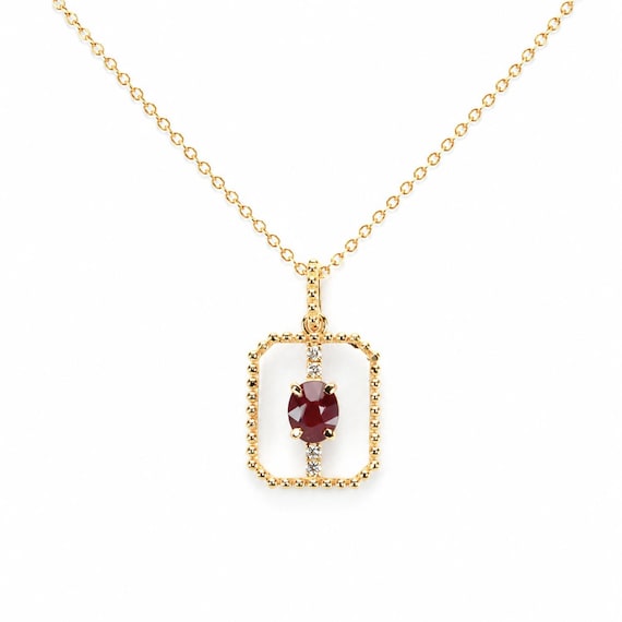 0.54ct Natural Ruby Pendant in 18K Yellow Gold with Diamond Accents