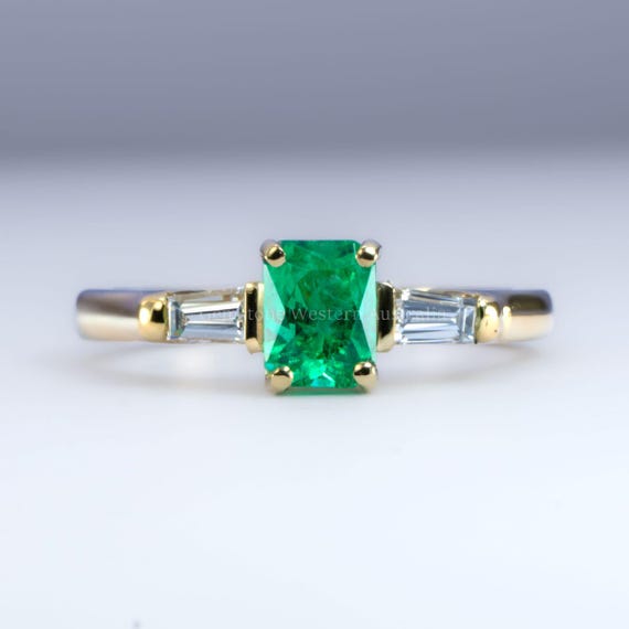 Natural Colombian Emerald Ring with Tapered Diamonds in 18K Yellow Gold – 0.78ct Emerald Cut