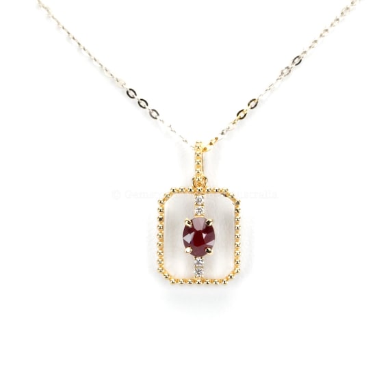0.54ct Natural Ruby Pendant in 18K Yellow Gold with Diamond Accents