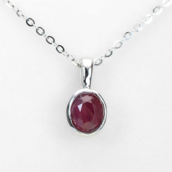 Ruby Platinum Pendant with Oval Cut Unheated Ruby in Bezel Setting
