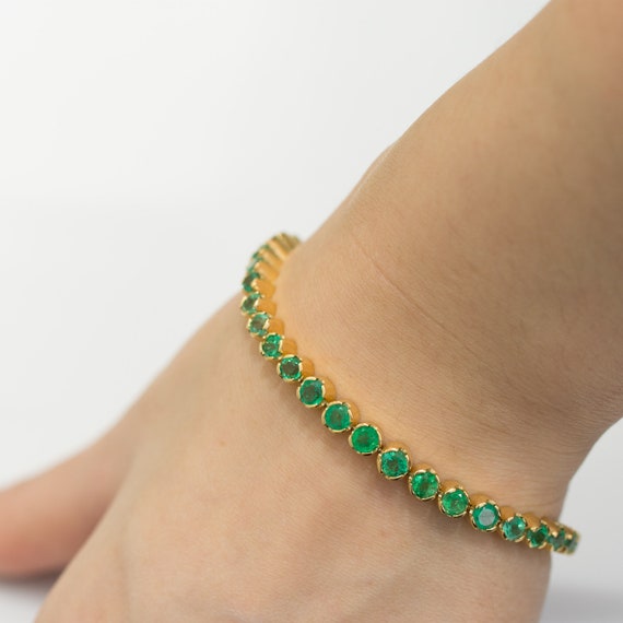 6.82ct Colombian Emerald Tennis Bracelet in 18kt Yellow Gold   39 Colombian Emeralds  Tennis Bracelet. Certified RRV 27600 AUD