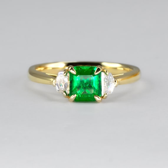 Emerald Cut Emerald and Cadillac Diamonds Three Stone Ring