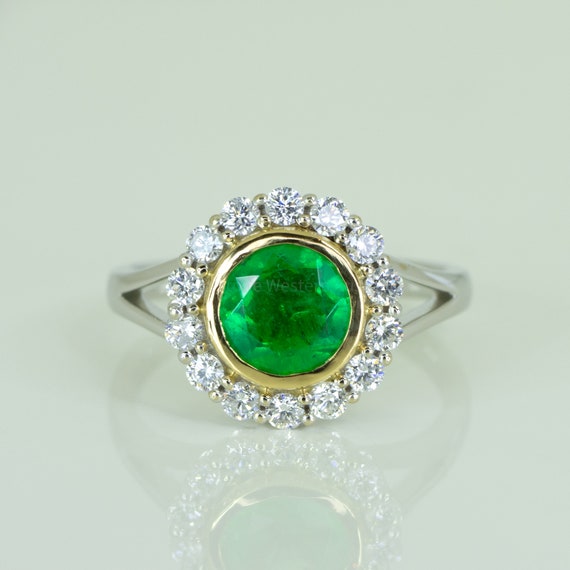 1.50 Carat Colombian Emerald and Diamond Halo Ring