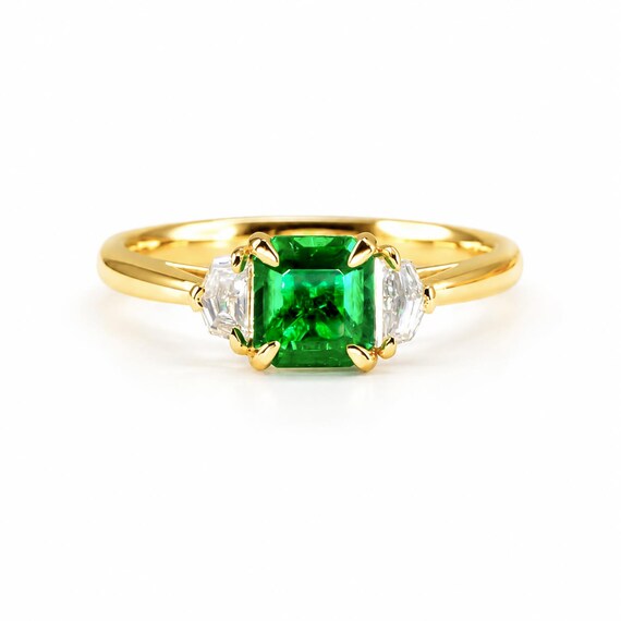 Emerald Cut Emerald and Cadillac Diamonds Three Stone Ring