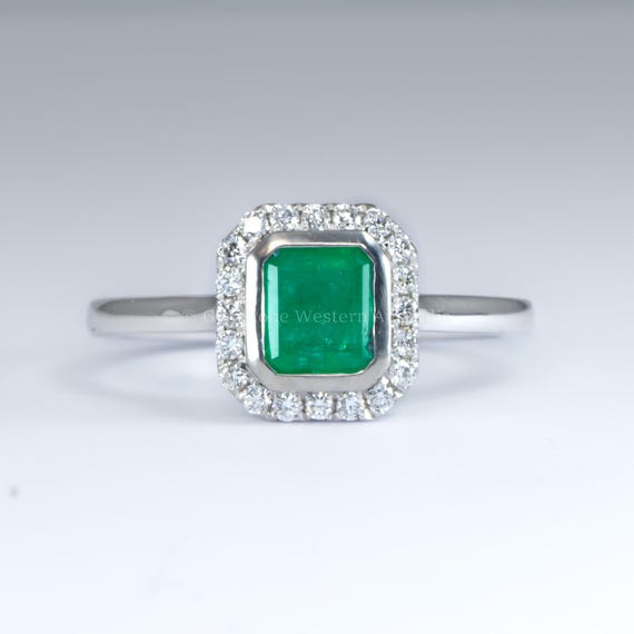 Emerald Cut Colombian Emerald Ring with Diamond Halo in Platinum