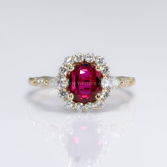 Natural Ruby Ring with Pear-Shaped Diamonds and Halo of Round Diamonds in 18K Yellow Gold | Natural Gemstone Jewellery
