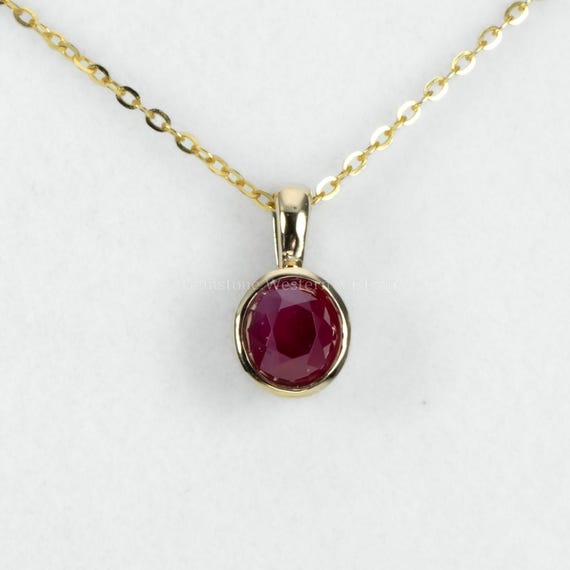 Bezel Set Unheated Ruby Pendant in 18K Yellow Gold