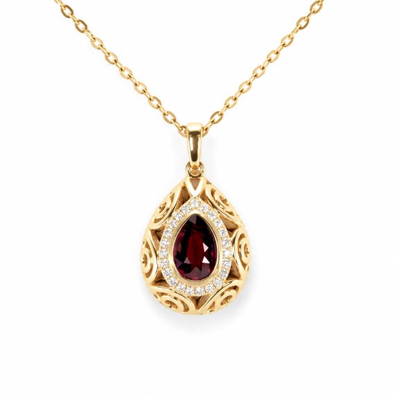 Pear Shape Unheated Ruby Pendant with Diamond Halo in Elegant Drop Design