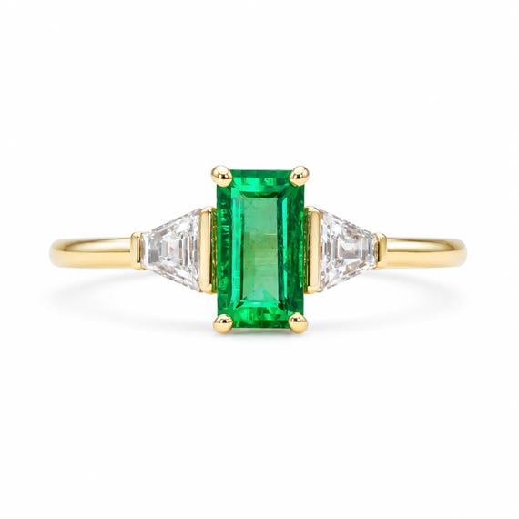 Elongated Emerald Cut Ring with Colombian Emerald and Trapezoid Diamonds in 18K Yellow Gold