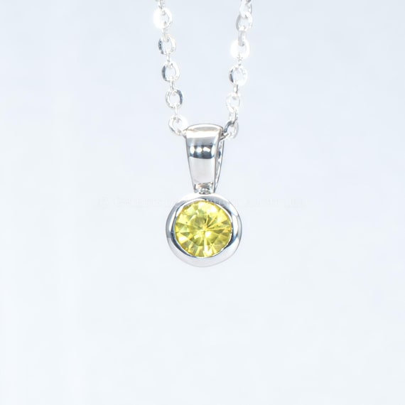 Platinum 950 Pendant with Natural Unheated Yellow Sapphire 0.32ct