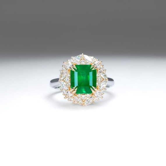Emerald Statement Ring with Diamond Halo in 18K Gold and Platinum