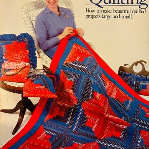 May include: A book titled "Lap Quilting: How to make beautiful quilted projects large and small." by Muriel Breckenridge. The cover features a woman sitting in a wicker chair, working on a red and blue quilt.