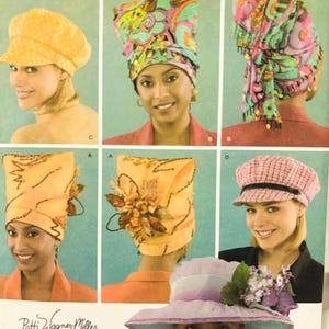 May include: A sewing pattern for five different hats. The hats are a yellow newsboy cap, a colorful turban, a pink and green patterned scarf, a yellow hat with a flower embellishment, a pink crocheted newsboy cap, and a lavender hat with a flower embellishment. The pattern is from Simplicity and is number 4651.