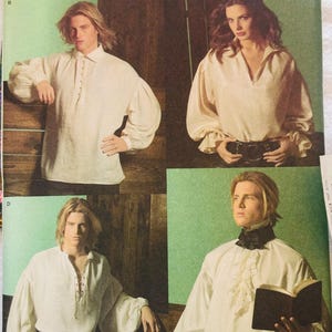 May include: A Simplicity 4219 sewing pattern envelope featuring four variations of long-sleeved, off-white shirts. The designs include button-front, V-neck, lace-up, and ruffled jabot styles. The package displays sizes XS, S, M, L, and XL.