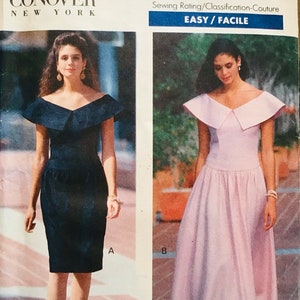 May include: A sewing pattern for a dress with a wide collar. The pattern is from Butterick and is for sizes 6-8-10. The pattern is rated easy to sew.