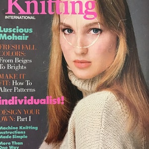 May include: Vogue Knitting International magazine cover featuring a woman wearing a cream-coloured knitted jumper. The cover text reads "Luscious Mohair", "Fresh Fall Colours", "From Beiges To Brights", "Make It Fit: How To Alter Patterns", "Individualist!" and "Design Your Own: Part I".