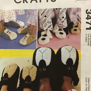 May include: A sewing pattern for making dog-shaped slippers. The pattern includes instructions for making both adult and child-sized slippers. The pattern is called "3471 One Envelope Une Pochette Un Sobre" and is from McCall's Crafts.