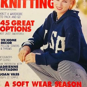 May include: Vogue Knitting magazine cover featuring a woman wearing a blue and white striped sweater and trousers. The cover text reads "45 Great Options" and "A Soft Wear Season".