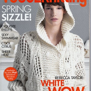 May include: A magazine cover featuring a woman wearing a white crocheted hooded sweater with the text "Vogue Knitting International" and "Spring Sizzle!" in red letters. The text "Rebecca Taylor: White Wow" is also featured in red letters.
