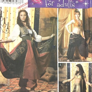 May include: Simplicity sewing pattern number 5359 for costumes for adults. The pattern includes three different costume options: a long skirt with a vest, a pair of pants with a top, and a skirt with a top. The pattern is for sizes 6, 8, 10, and 12. The pattern is for European sizes 32-38 and French sizes 34-40.