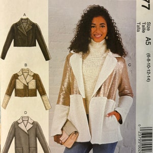 May include: A sewing pattern for a jacket with four different styles. The pattern is for sizes 6-8-10-12-14. The pattern is from McCall's and the pattern number is M7877.