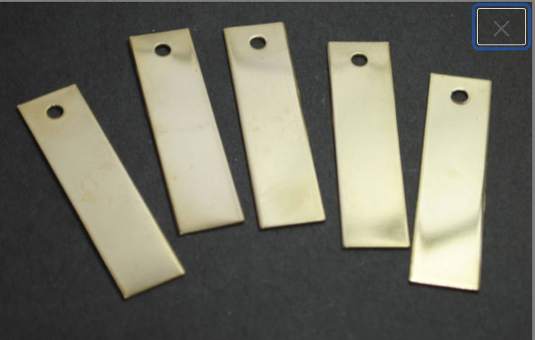 One Hundred Brass Keychains 1/2