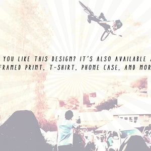 May include: A person on a bicycle performing a trick in front of a crowd. The text "DO YOU LIKE THIS DESIGN? IT'S ALSO AVAILABLE AS A FRAMED PRINT, T-SHIRT, PHONE CASE, AND MORE!" is displayed on a white background with a radial pattern.