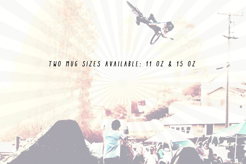 May include: Two mug sizes available: 11 oz & 15 oz. A vintage-style image with a cyclist performing a trick on a dirt bike ramp. The image has a faded, sun-bleached effect.