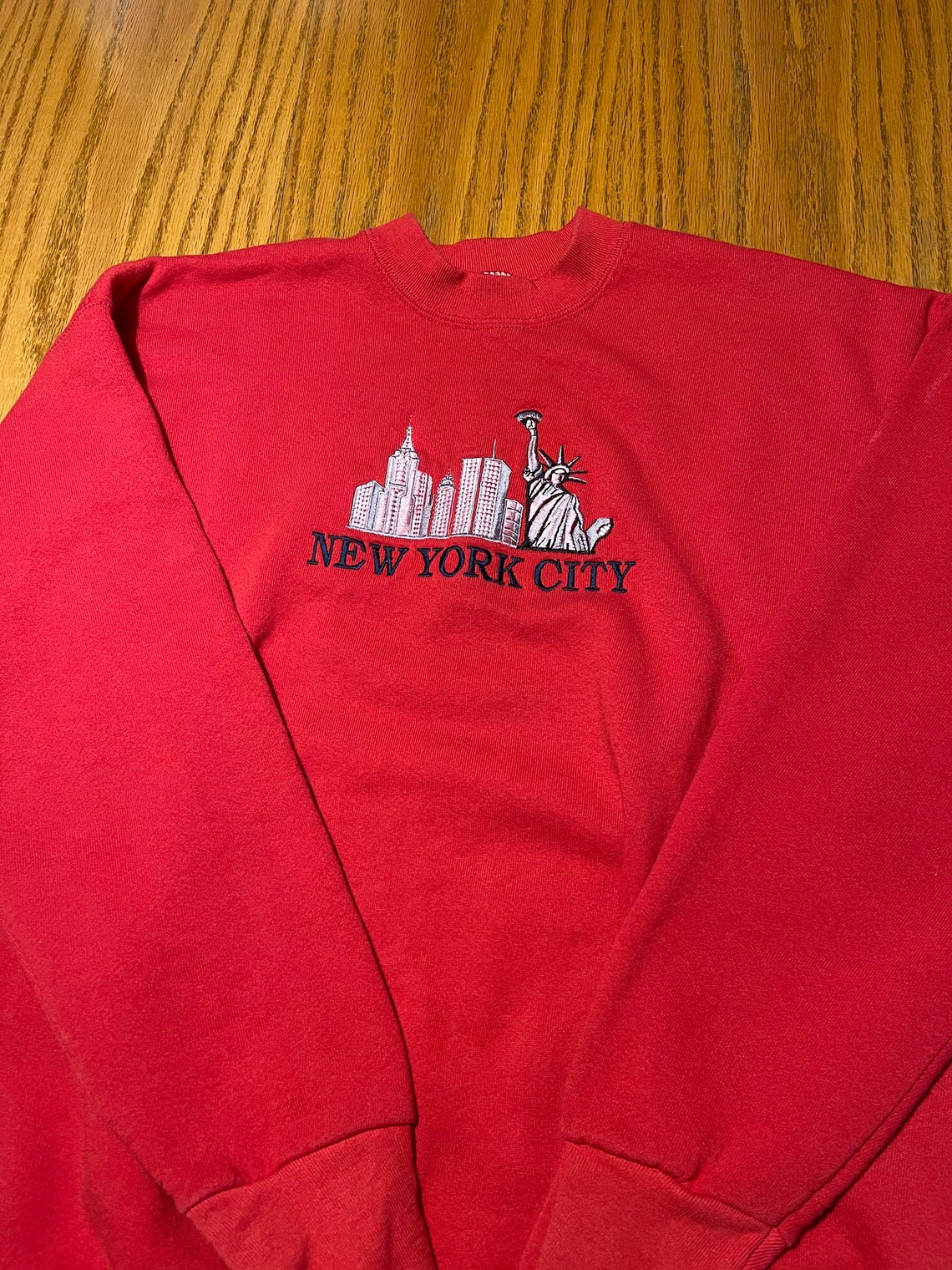 red sweats with white stripe