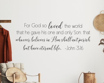 May include: A black wall decal featuring the text: For God so loved the world that he gave his one and only Son. that whoever believes in Him shall not perish but have eternal life. -John 3:16, displayed in a mix of script and sans-serif fonts.