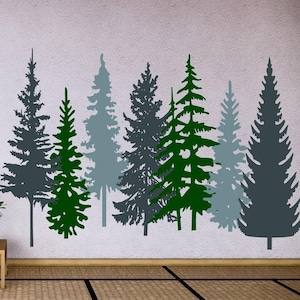 May include: A wall decal set featuring a series of stylized pine trees in varying shades of dark gray, forest green, and light blue-gray. The trees are arranged in a row, displaying different heights and branch patterns across the wall surface.