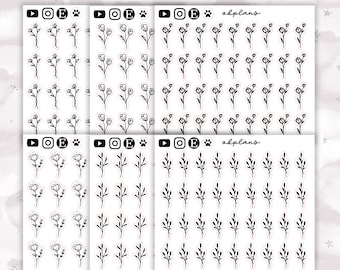 May include: Four sheets of stickers with black and white floral and branch designs. The stickers are arranged in a grid pattern. The top sheet has the text "okplans" in black lettering. The bottom sheet has the text "@OKPLANS" in black lettering.