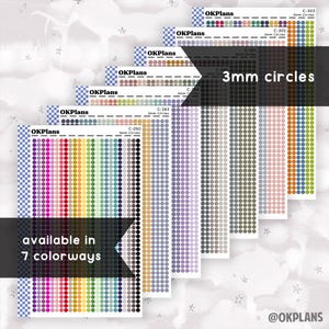 May include: Seven sheets of 3mm circle stickers in various colors, including pink, orange, yellow, green, blue, purple, and gray. Each sheet has a label with the text "OKPlans" and the code number for the sticker sheet. The text "3mm circles" is displayed in a large font at the top of the image. The text "available in 7 colorways" is displayed in a box at the bottom of the image.