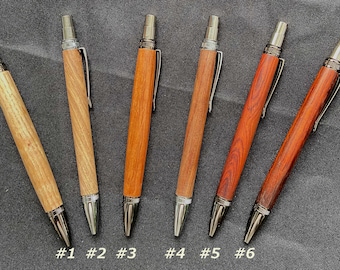 Elegant Blade Style Button Click Pen Featuring Woods Of The World