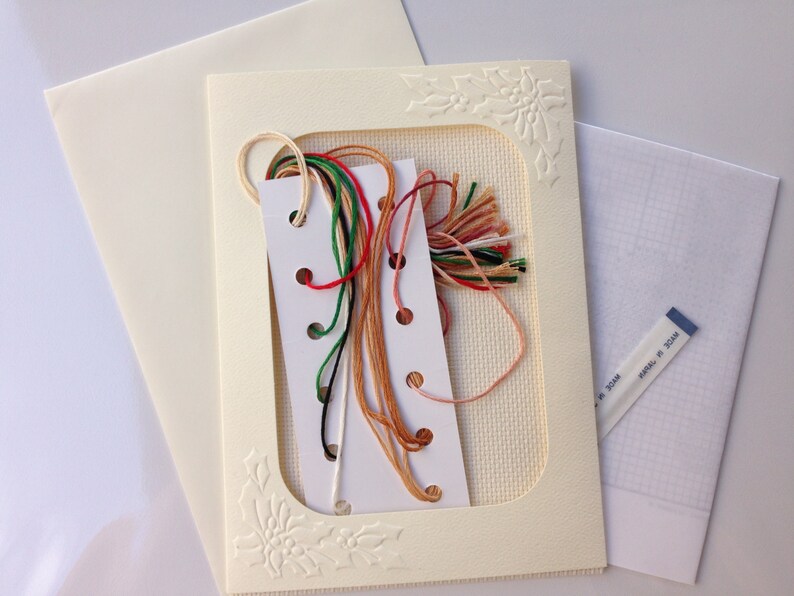 Christmas Card design in counted cross stitch Candles in Pine Mantle display