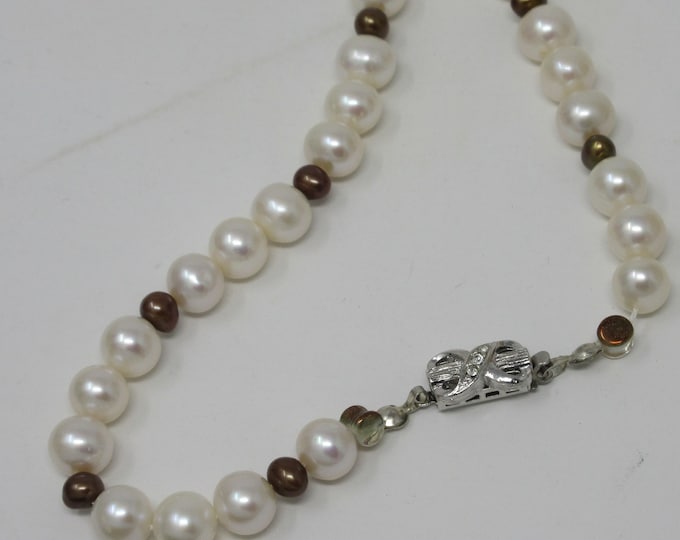 Freshwater Pearls,  and dyed brown potato shape pearls. Choker