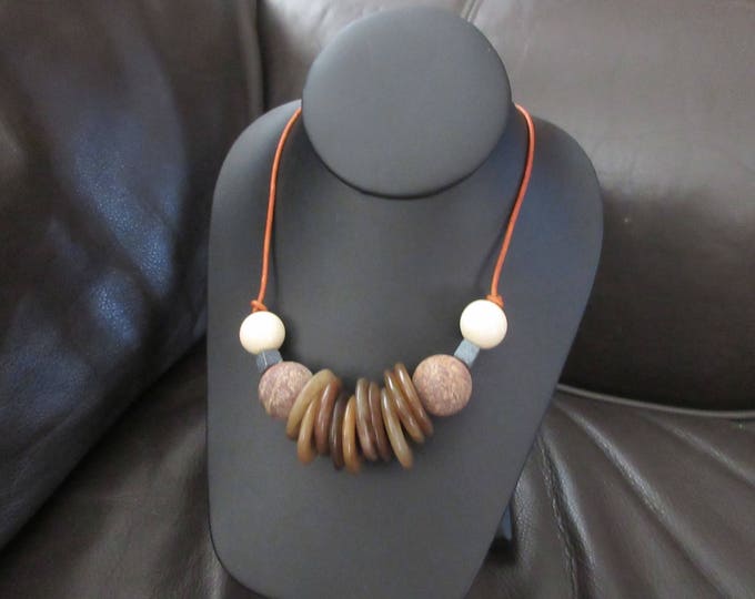 Single Strand and hand-beaded  Large jade disks and Leather Necklace