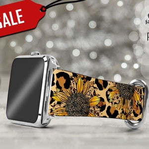 Pode incluir: Uma pulseira de relógio com fundo de estampa de leopardo e design de girassol. A pulseira é feita de um material macio e flexível e é compatível com Apple Watch.