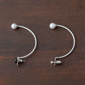 Pearllure  ear jacket single earring_ silver_ freshwater pearls, gift for women_stacking earrings_ by Ariadni Kypri, Ydor collection.